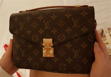 como diferenciar una cartera louis vuitton original|authentic Louis Vuitton purses.